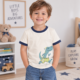 Camiseta Carter’s para niño color crema con estampado de dinosaurio