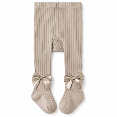 Panty medias para niña color beige con moños decorativos